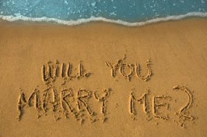 engagement in sand photo